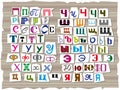 Latin alphabet, made up of letters of different sizes and shapes, is drawn in the style of inscriptions from detective stories. Royalty Free Stock Photo