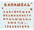 Cyrillic caramel alphabet. Paper cut out sweet letters and numbers.