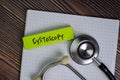 Cystoscopy write on sticky notes isolated on Wooden Table Royalty Free Stock Photo