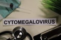 Cytomegalovirus with inspiration and healthcare/medical concept on desk background