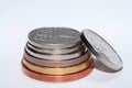 Czech coins of different denominations isolated on a white background. Lots of Czech coins. Macro photos of coins.