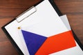 Czech document, mockup for text on clipboard, white sheet of paper in a folder for notes with Czech flag Royalty Free Stock Photo