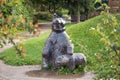 Czech Republic. Bear sculpture and a small teddy bear in the Prague zoo. June 12, 2016