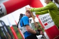 Czech Republic, Beskydy: May 2019. Perun Sky Marathon. Runner at the finish line receives a medal