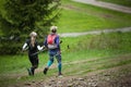 Czech Republic, Beskydy: May 2019. Perun Sky Marathon. Women running downhill from Javorovy Hill