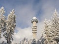 Czech Republic, Brdy mountains, January 9, 2021: View of meteorologic radar tower on top of Praha hill in winter forest