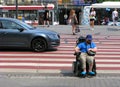 Disabled person in a wheelchair, crosswalk