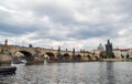 Czech Republic, Charles Bridge across Vltava river on which the ship sails Royalty Free Stock Photo