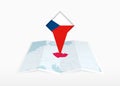 Czech Republic is depicted on a folded paper map and pinned location marker with flag of Czech Republic Royalty Free Stock Photo