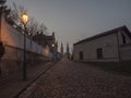 Czech Republic, Prague, February 23, 2021: Night view of Cobbled street at Vysehrad with lanterns and illuminated Royalty Free Stock Photo