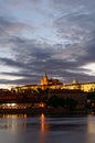 Czech Republic, Prague, Night view on Hradcany castle.Beautifully lit castle and Vltava river in the foreground.