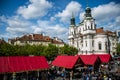 Czech Republic Prague 11.04.2014: People on market in front of saint nikolaus church