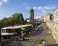 Czech Republic, Prague, September 8, 2018: Houseboat Klodylda nad Sitkovska water tower with Manes Gallery and people