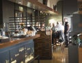 Czech Republic, Prague, Sporilov, April 7, 2018: group of people sitting and drinking at restaurant table in Potrefena Husa, look Royalty Free Stock Photo