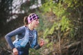 CZECH REPUBLIC, SLAPY, October 2018: Trail Maniacs Run Competition. Profil Photo of Young Running Woman.