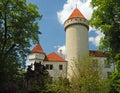 Czech state castle chateau Konopiste with round tower and green