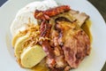 Czech traditional cuisine dumplings cabbage and pork meat on a plate. Top view and selective focus Royalty Free Stock Photo