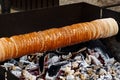 Czech trdelnik split cake with cinnamon and sugar.