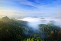 Czech typical morning autumn landscape. Hills and villages with foggy sky. Morning fall valley of Bohemian Switzerland park. Hills Royalty Free Stock Photo