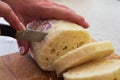 Czech yeast dumpling sliced into wheels and put into a steaming pot to keep the dumpling hot