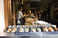 Czechia people making and grilling bread prague style called Trdelnik for sale