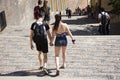 Czechia people with travelers boyfriend and girlfriend walking hand in hand on walkway