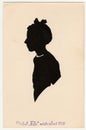 Vintage silhouette of girl. Text in Czech: Cut by Efo master of silhouettes 1950.