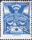 Czechoslovakia Circa 1920: A postage stamp printed in Czechoslovakia showing a graphic representation of a pigeon with a letter