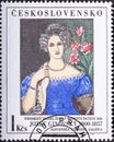 CZECHOSLOVAKIA - CIRCA 1985: a stamp printed in the Czechoslovakia shows Young Woman in a Blue basgown,by Jozef Ginovsky