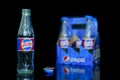 Czluchow, Pomorskie / Poland - September, 24, 2020: An empty sweet drink bottle. Glass packaging used to store pepsi