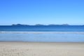 CÃÂ­es islands. Ocean beach.Beautiful white sand beach and ocean waves with clear blue sky Royalty Free Stock Photo