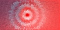 A 3D abstract explosion of rectangular blocks radiates from a red center, forming a dynamic spiral pattern with red and blue tones