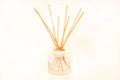 3D of an air refresher bottle and wooden sticks isolated on a white background