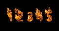3d alphabet, numbers made of fire on black background, 12345 Royalty Free Stock Photo