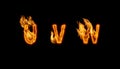 3d alphabet, letters made of fire on black background, UVW Royalty Free Stock Photo