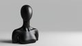 3D Black Mannequin Head and Torso Isolated on Grey Surface Royalty Free Stock Photo