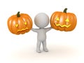 3D Character Holding Up Two Halloween Jack-O-Lantern Pumpkins Royalty Free Stock Photo