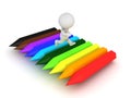 3D Character running on top of rainbow colored crayons Royalty Free Stock Photo