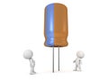3D Characters Looking Up at Large Capacitor Royalty Free Stock Photo