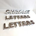 3D Chrome Letters with Shining Effect isolated on white background Royalty Free Stock Photo