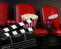 3d Cinema clapper board, popcorn and drink. Royalty Free Stock Photo