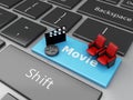 3d Cinema Clapper board and theater seat on computer keyboard. Royalty Free Stock Photo