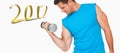 3D Composite image of fit young man exercising with dumbbell Royalty Free Stock Photo