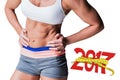 3D Composite image of midsection of muscular female athlete