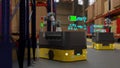3D computer Generated image:the Collaborate of AGV and COBOT in smart warehouse