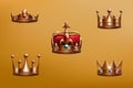 3d crown, golden jewel collection. Royal king or queen symbols, prince or princess headwear with red gemstones Royalty Free Stock Photo