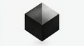 A 3D cube with a textured gray surface and a black base. Royalty Free Stock Photo