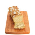 3d cut loaf of bread on a wooden board isolated on a white background. Royalty Free Stock Photo