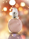 3D decorative perfume bottle on a bokeh lights background Royalty Free Stock Photo