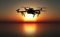 3D drone flying above a sunset sea Royalty Free Stock Photo